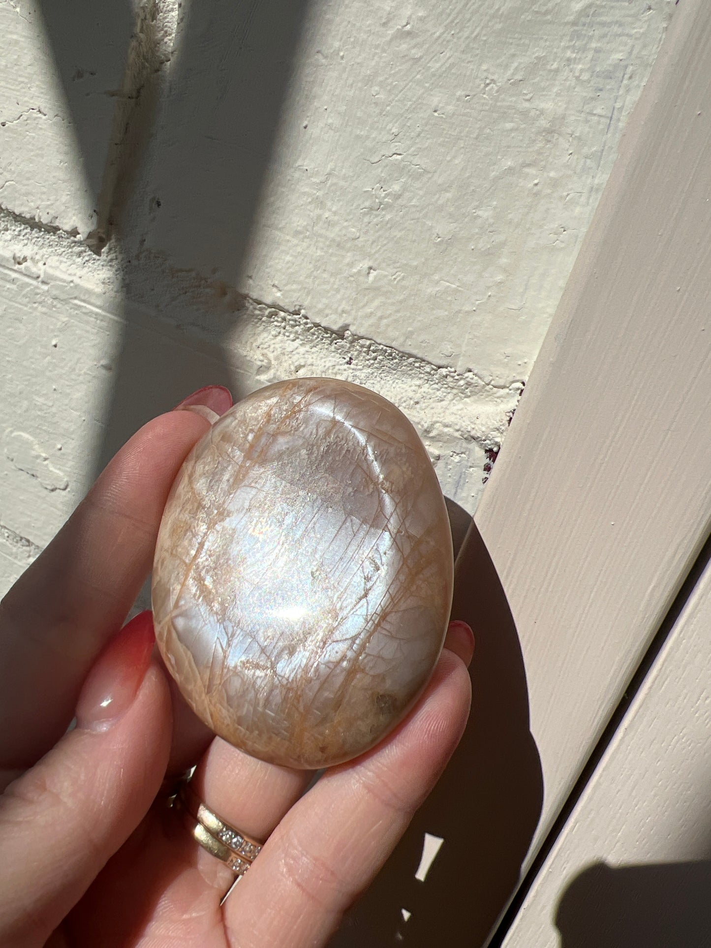 Peach Moonstone Palm Stone (Blue and Silver Flash)